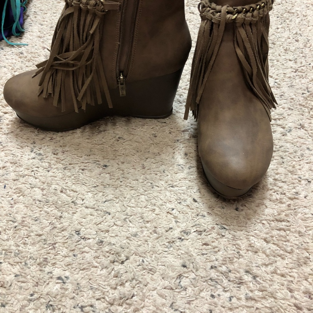 Fringe wedges worn once